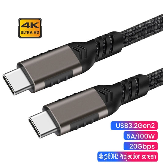 A USB-C to USB-C cable with a braided black design, featuring metallic gray and black connector housings. The image includes text overlays highlighting its features: '4K ULTRA HD', 'USB3.